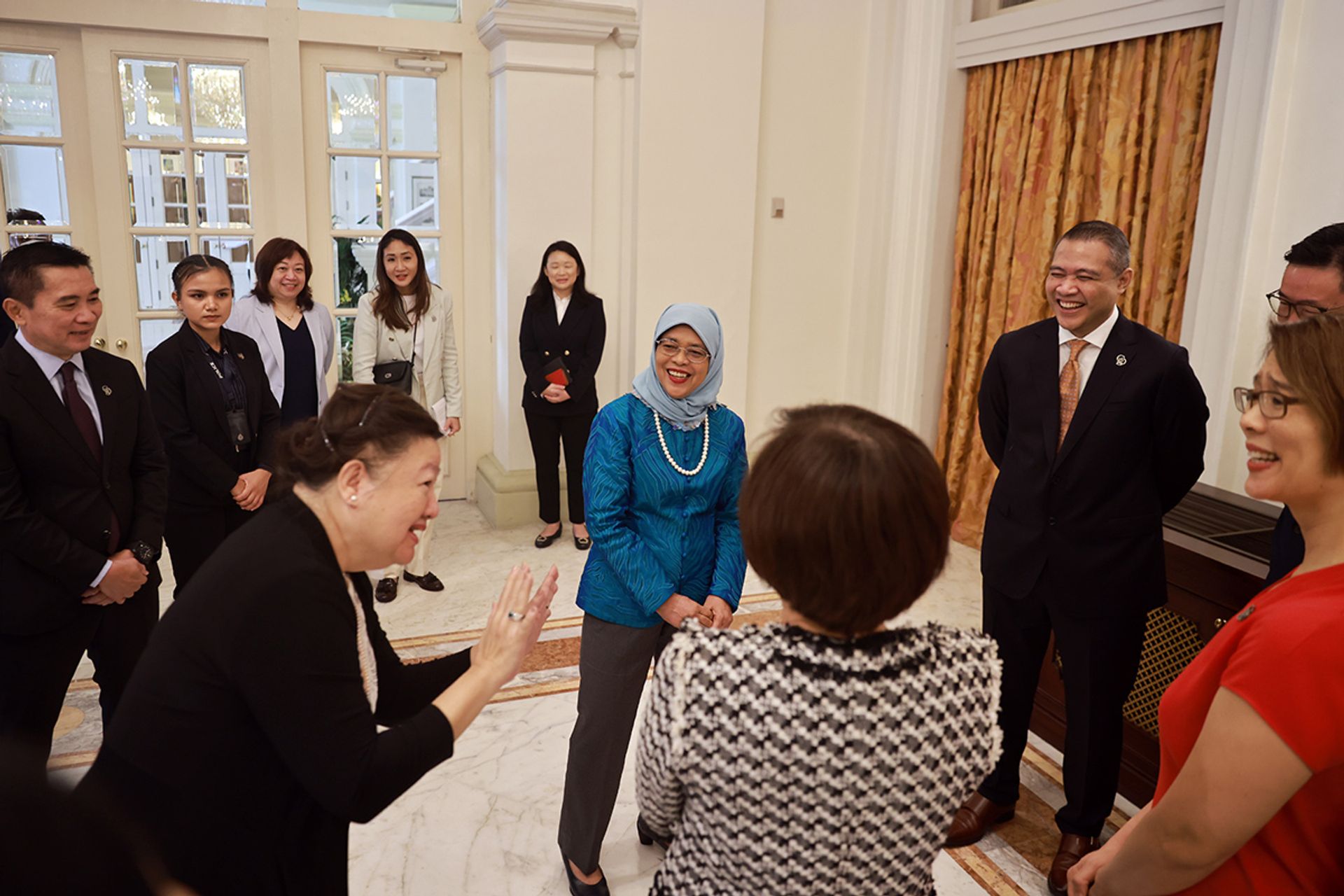 President Halimah with members of the Council for Board Diversity at the Istana on June 5, 2023. The council was established by the Ministry of Social and Family Development in 2019 under the patronage of the President, and aims to promote female representation on the boards of listed companies, statutory boards and non-profit organisations as a stepping stone to broader diversity. ST PHOTO: JASON QUAH