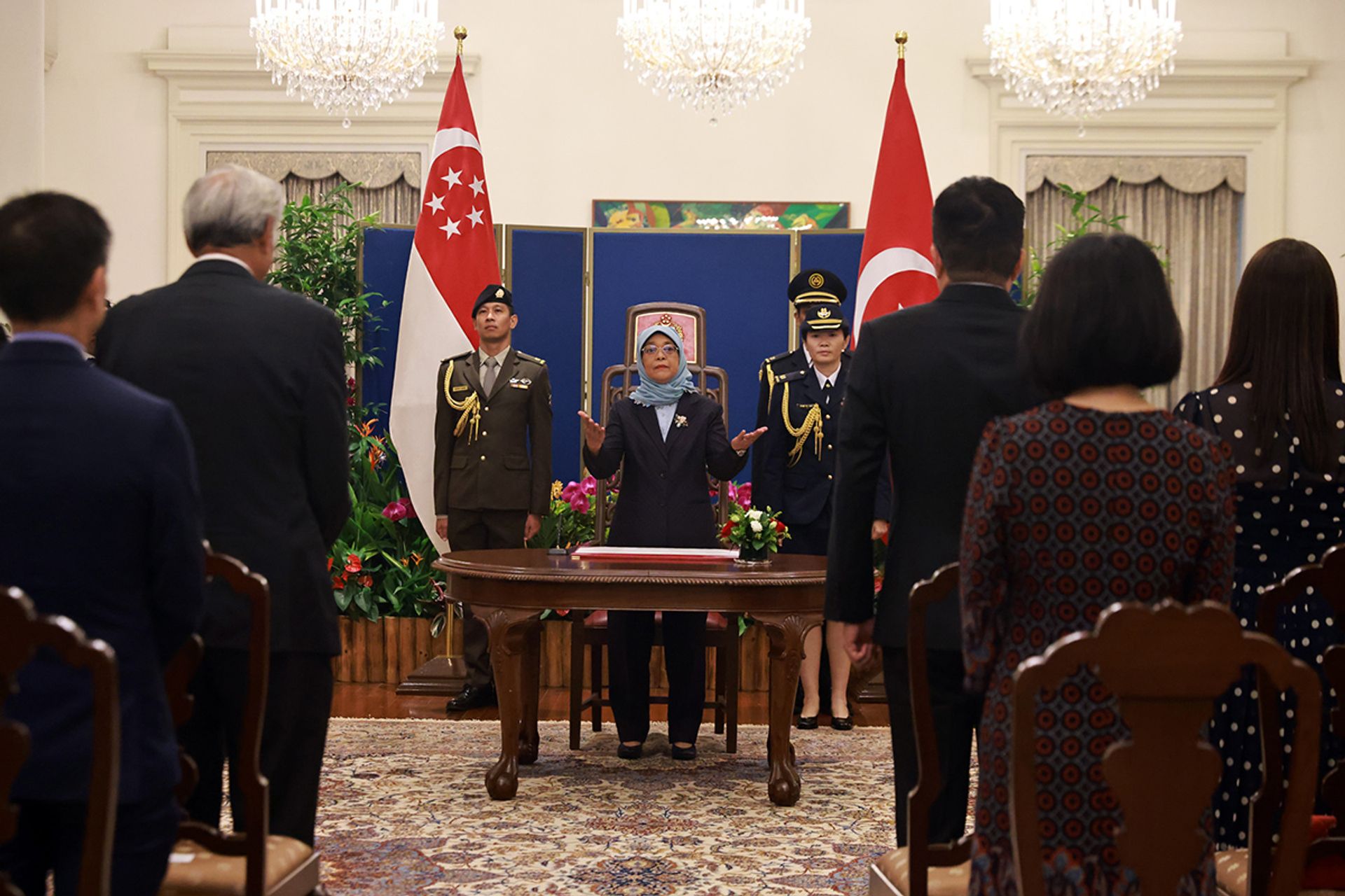 President Halimah officiating a swearing-in and appointment ceremony for public servants at the Istana on June 5, 2023. ST PHOTO: JASON QUAH