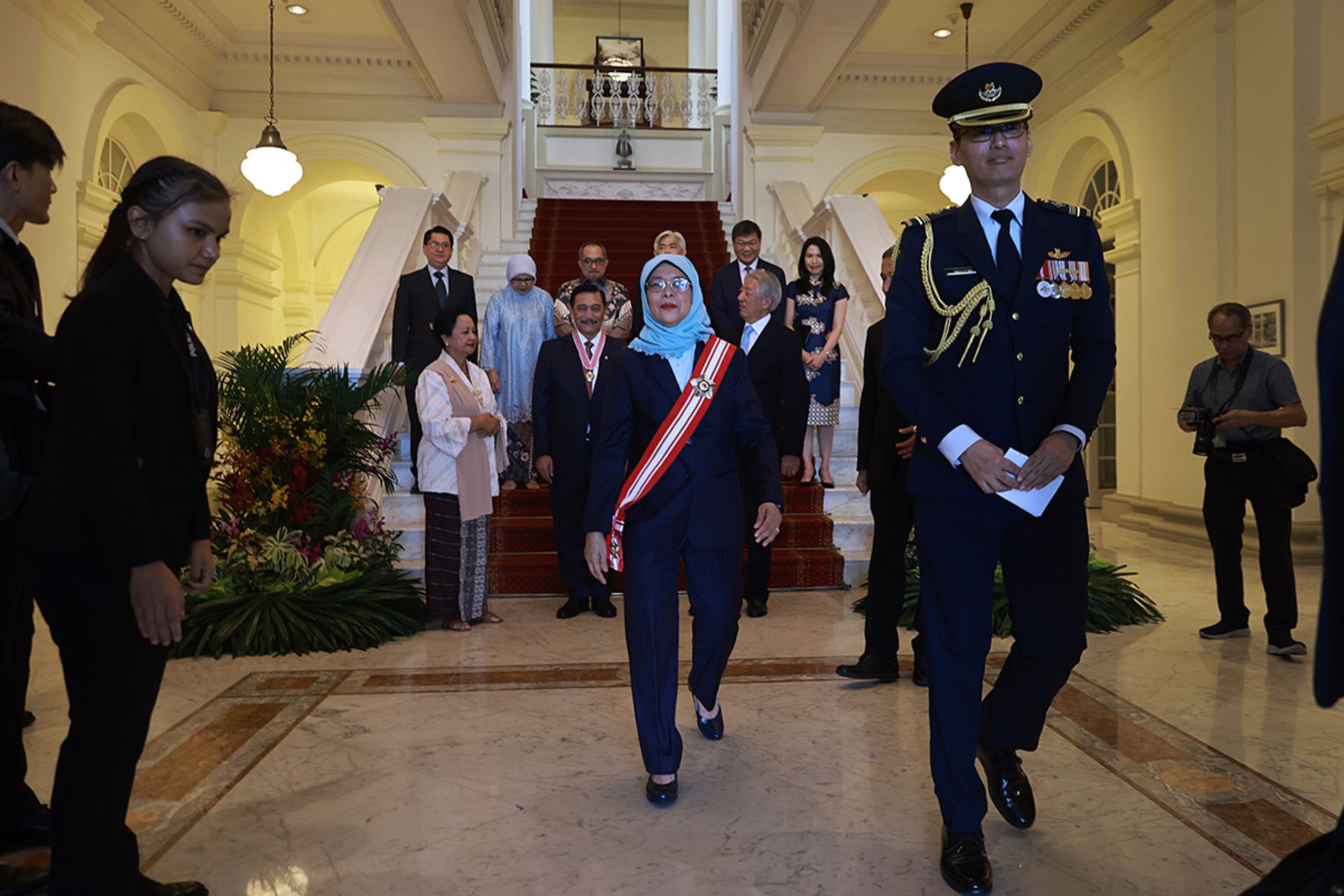 President Halimah leaving at the end of her engagements for the day at the Istana. ST PHOTO: JASON QUAH
